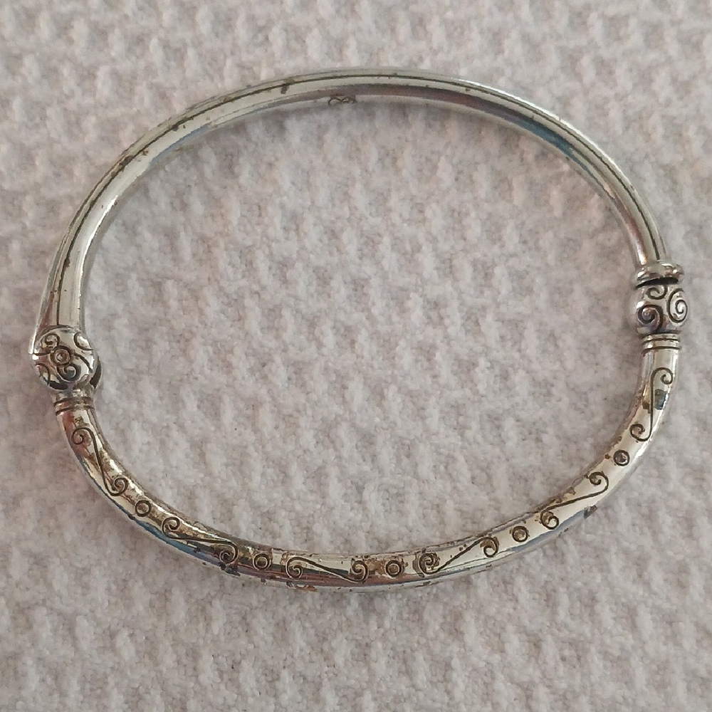 Elegant Silver and Gold-Toned Bangle